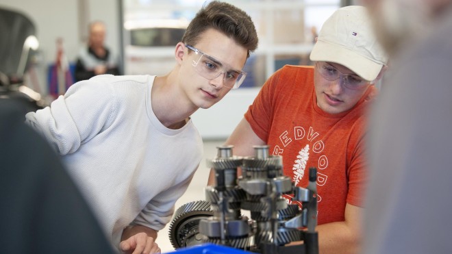 Automotive Service Technician students working in automotive lab