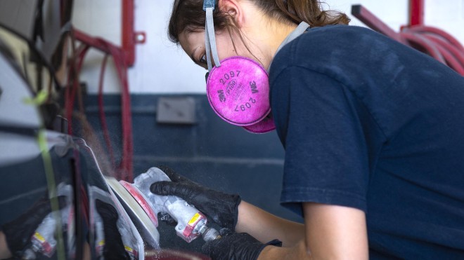 Fanshawe auto body student working on vehicle