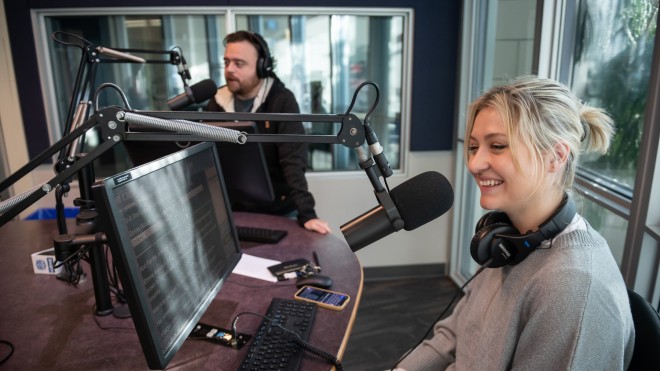 Student broadcasting from a radio station