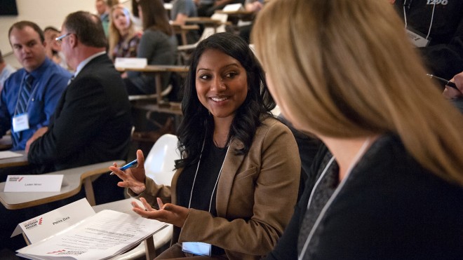 Photo of a student speaking with a mentor at the mentorship fair