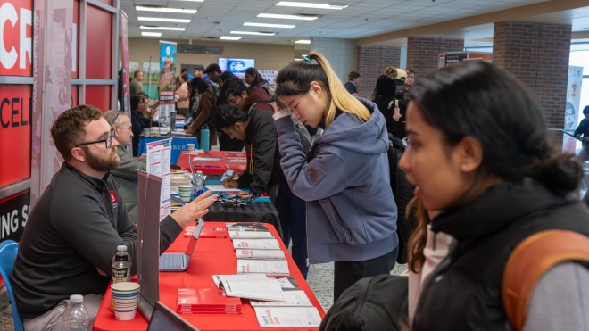 student considers educational pathway options at fanshawe's pathways fair