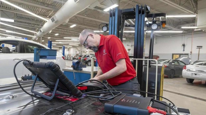 Instructor performs tests at Fanshawe's Green Vehicle Lab