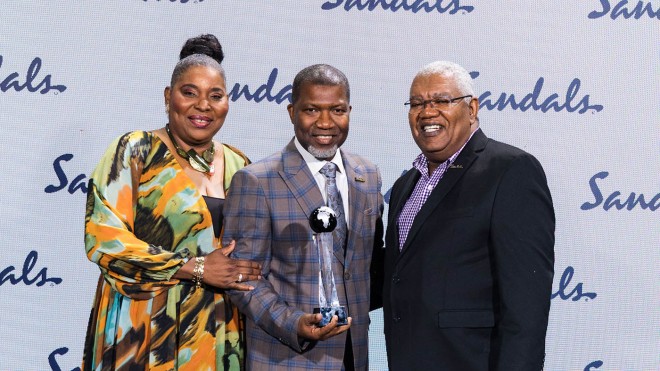 Maureen Barnes-Smith and Gary Sadler present Richard Todd with his award