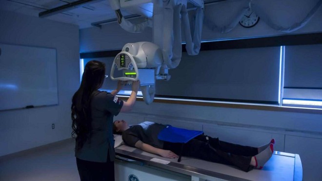 MRT tech performs a scan