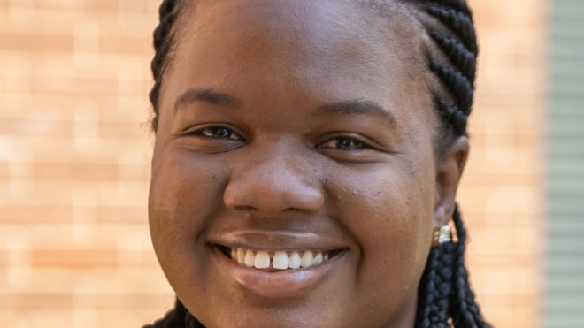 A portrait of Shadé Dias at the College.