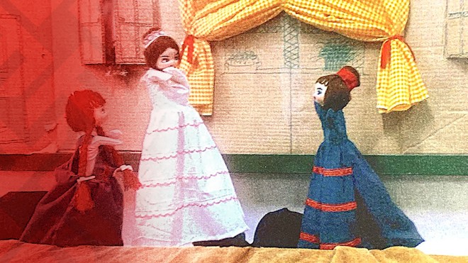 Closeup of fabric puppets in a doll house