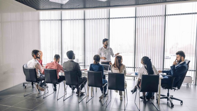 A group of researchers in a boardroom.