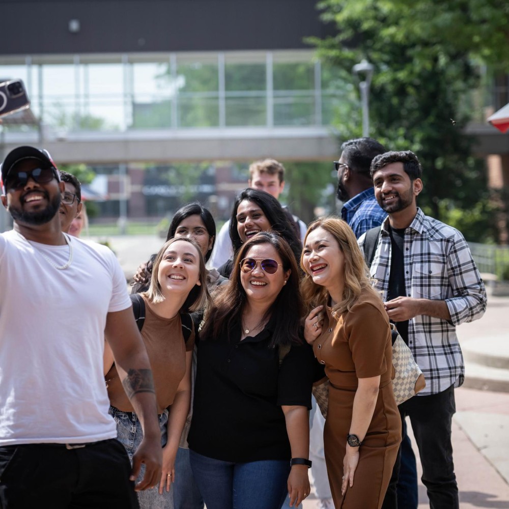Photo of a group of students posing for a selfie