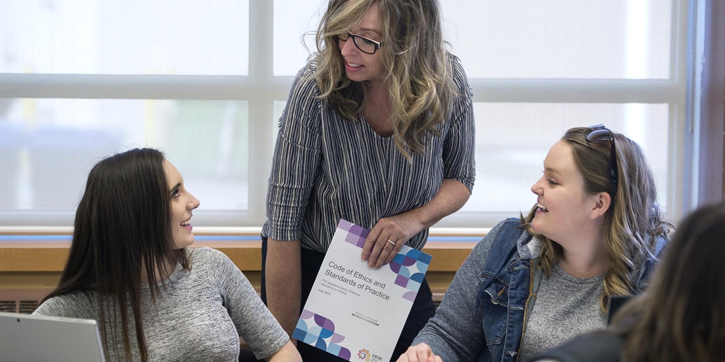 Fanshawe ECE instructor speaking with students