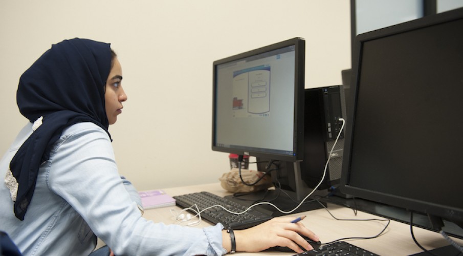 Student studying on a computer