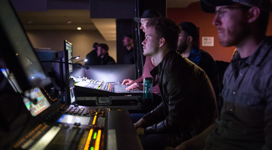 Photo of a music industry professional watching a concert