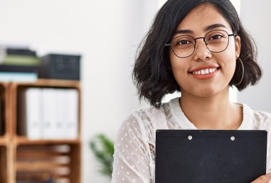 Bachelor of Behavioural Psychology, Female holding a clipboard
