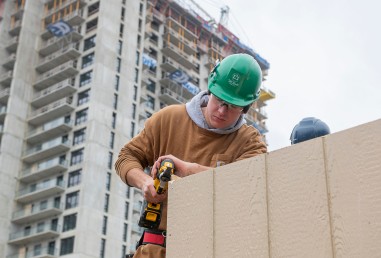 Construction student working at a job site