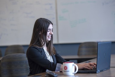 Female entrepreneur working on her laptop