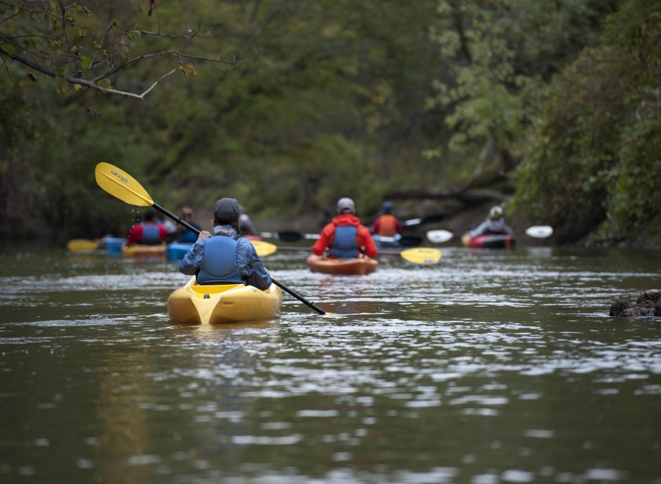Adventure Expeditions and Interpretive Leadership students, kayaking down river