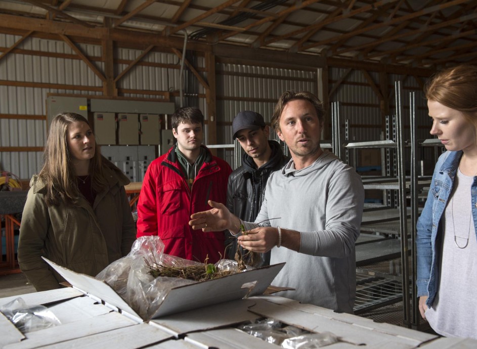 Fanshawe instructor teaching agri-business students at EZ Grow Farms