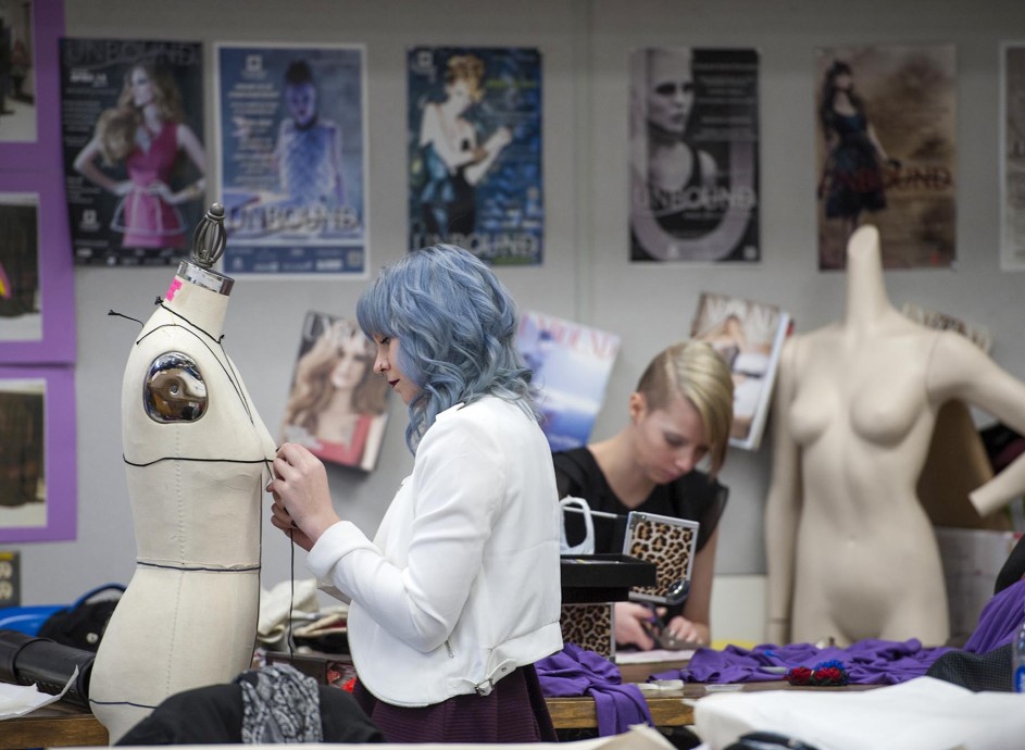 Fashion Design student working on project in design studio