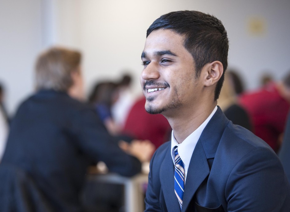 Fanshawe business student, smiling in classroom