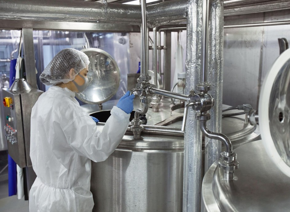 Person looking at gauges in food processing facility