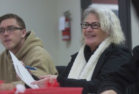 A couple of adult learners seated in class