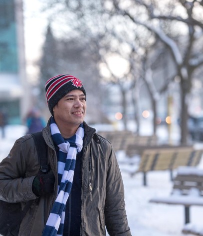 Student outside in winter