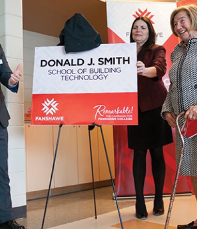 Photo of Fanshawe President unveiling the new school name