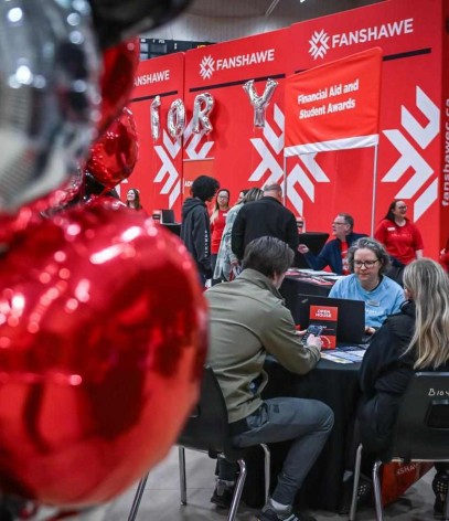 prospective students visit financial aid at open house