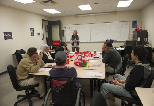 Diverse group of adult learners seated in a classroom