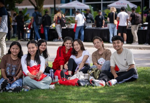 group of students sitting together during orientation