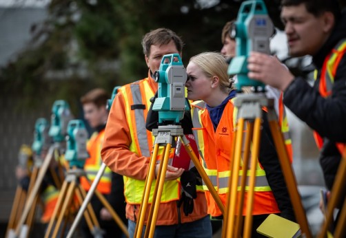 civil engineering students complete surveying