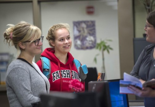 Fanshawe student being serviced by the financial aid staff