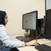 Student studying on a computer