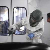 Auto Body Repairer Apprentice student working in auto body shop at Fanshawe College