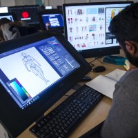 3D Animation and Character Design student working in computer lab