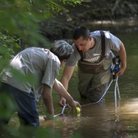 Two Environmental Technology students, taking samples in Stoney Creek