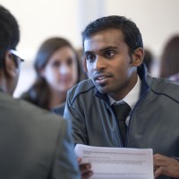 Fanshawe business student, in classroom setting, working with fellow classmates