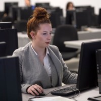 Business professional working on computer
