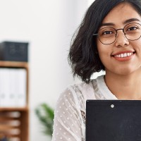 Bachelor of Behavioural Psychology, Female holding a clipboard