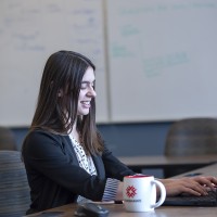 Female entrepreneur working on her laptop