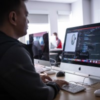 Interactive Media Design student learning in computer lab