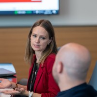 People are discussing at the training course graduation
