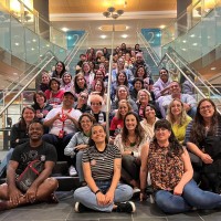 a group of teachers are at the library