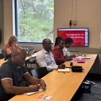 People are in a writing class