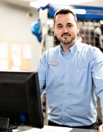 Employee behind a service desk