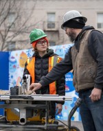 Fanshawe instructor teaching a student to use a table saw