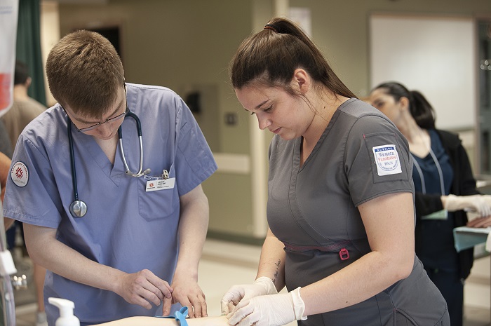 Learning how to insert an IV needle