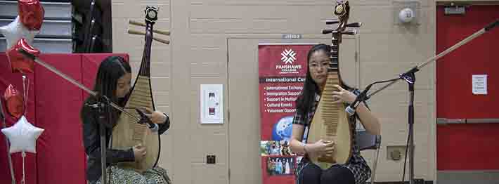 international students playing instruments