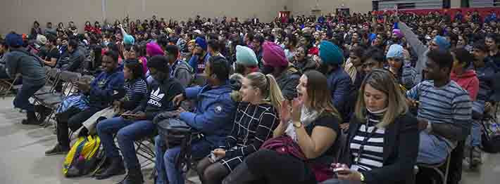 students at college assembly