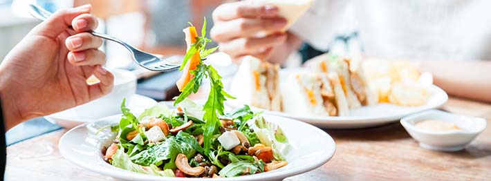 friends eating vegan food