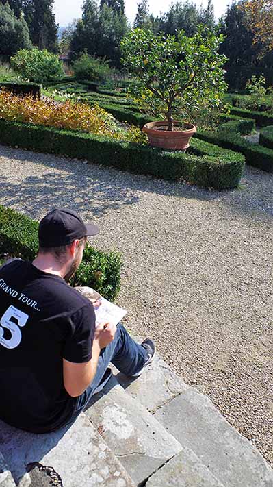 Student sketching in Villa Petraia, an essential part of the study abroad program.